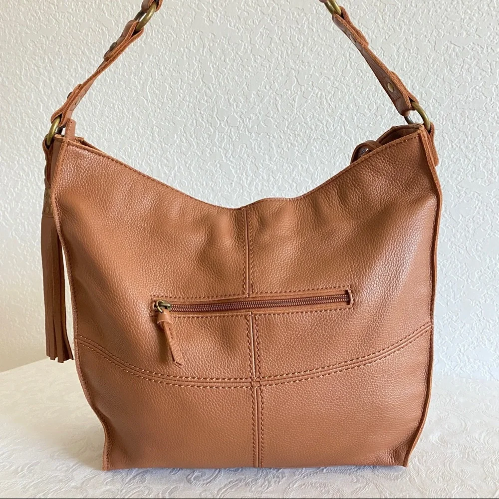 The sak brown leather studded hobo bag